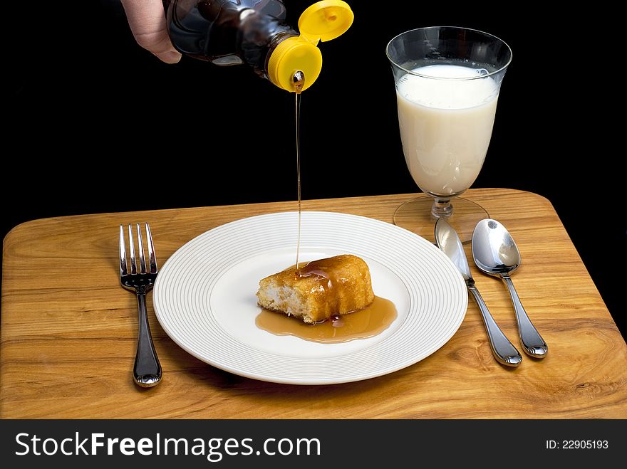 Adding sweetness to a sweet snack cake. Adding sweetness to a sweet snack cake