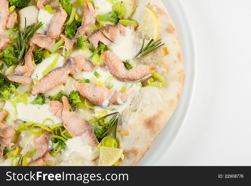 White pizza with lemon and salmon