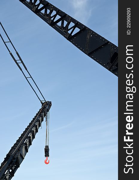 Port crane in Lisbon marina, Portugal.