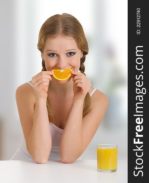 Beautiful Girl Full Of Life With Orange Juice