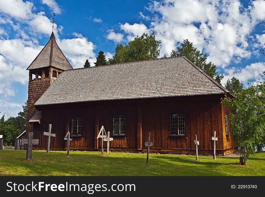 The old stave church at Sarna, Sweden. Most of it dates back to 1684 with some elements of Celtic art. Note the fencing, which is characteristic of Sweden.