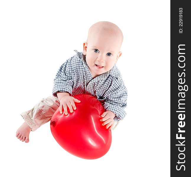Valentine's day baby boy holding red heart shaped balloon. Valentine's day baby boy holding red heart shaped balloon