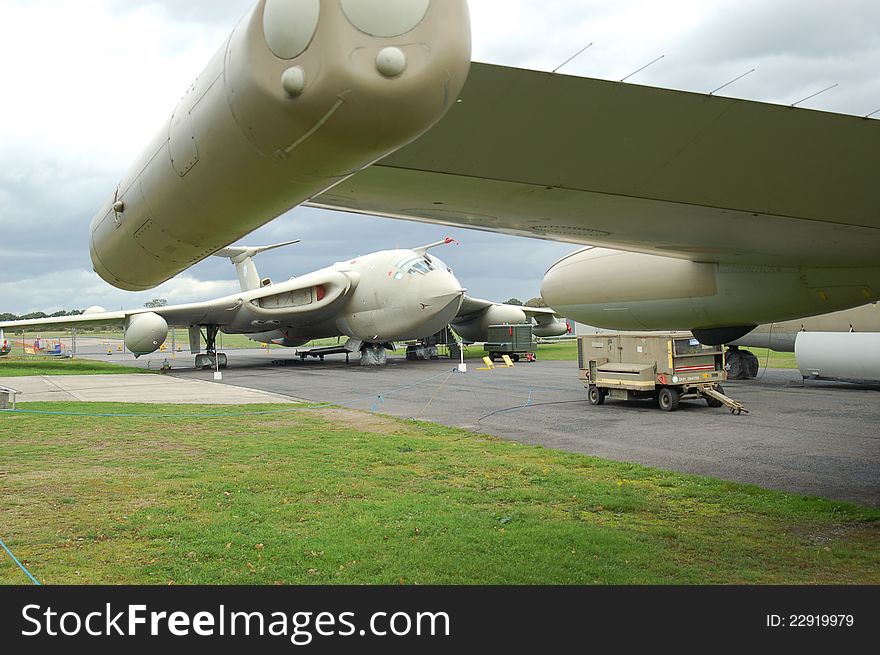 Handley Page Victor V-bomber preserved at Elvington airfield in Yorkshire viewed under the wing of a BAe Nimrod AEW aircraft. Handley Page Victor V-bomber preserved at Elvington airfield in Yorkshire viewed under the wing of a BAe Nimrod AEW aircraft.