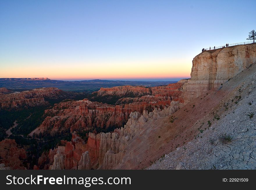 Visitors to Bryce Canyon enjoy a beautiful sunset from the park\'s highest overlook. Visitors to Bryce Canyon enjoy a beautiful sunset from the park\'s highest overlook.