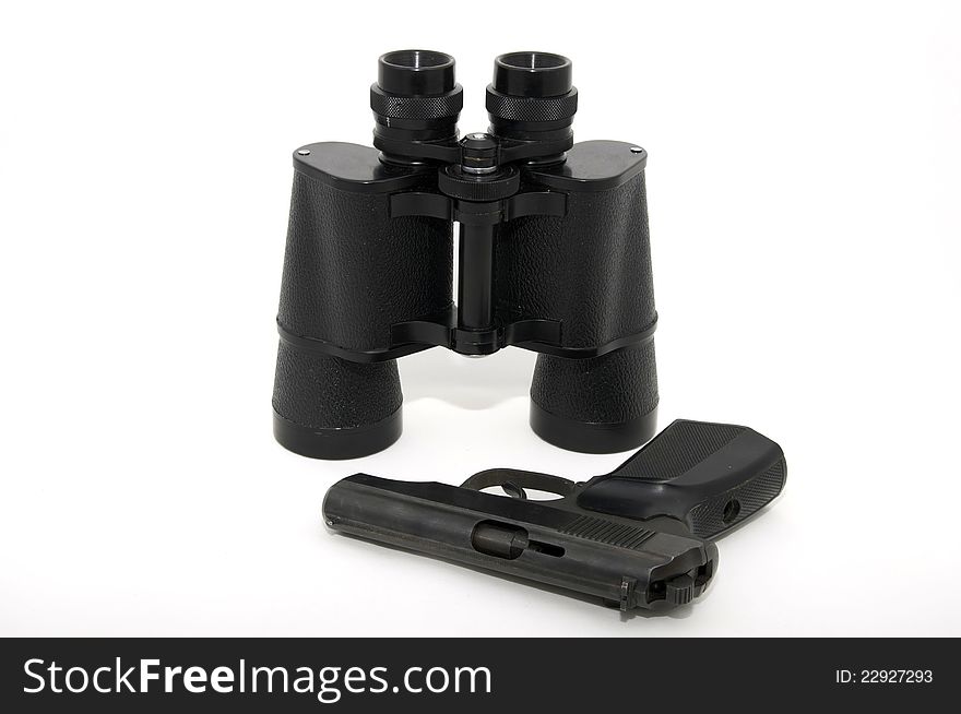 Binoculars And Gun