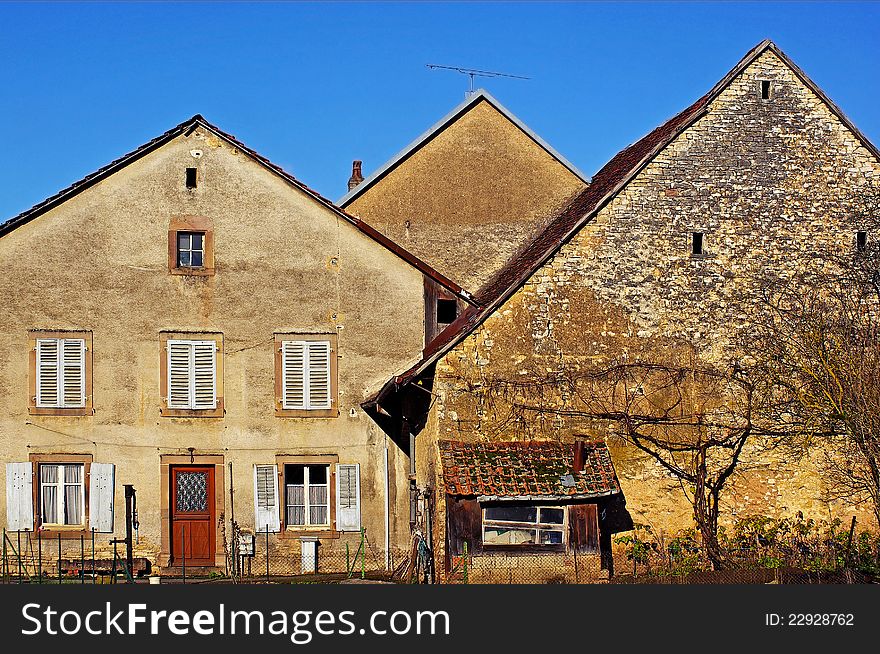 Farms in a village in the french countryside. Farms in a village in the french countryside.