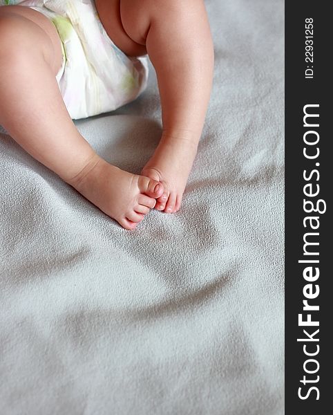 Beautiful small baby girl feet