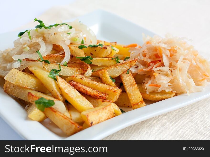 Sliced â€‹â€‹potatoes With Onions And Sauerkraut