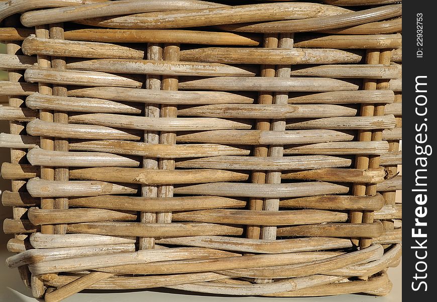 Wicker basket on the grill pot in the summer sun. Wicker basket on the grill pot in the summer sun.