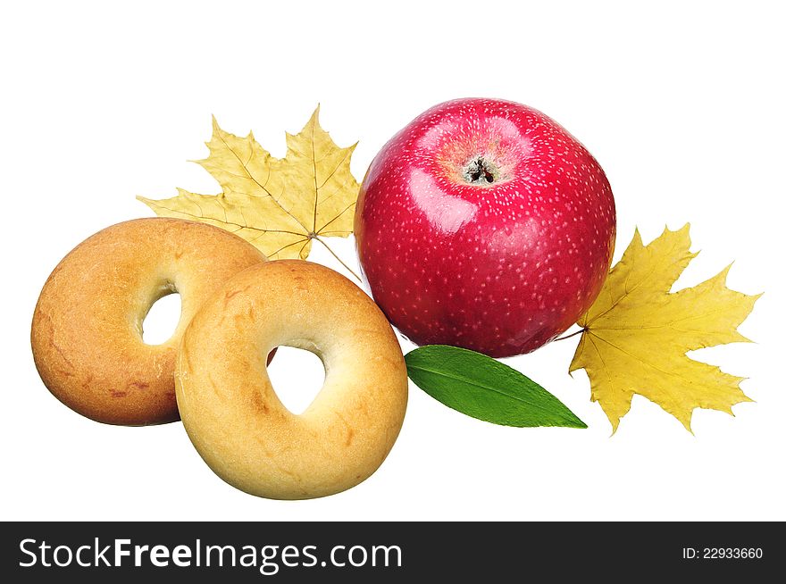 Apple and bagels isolated on a white background