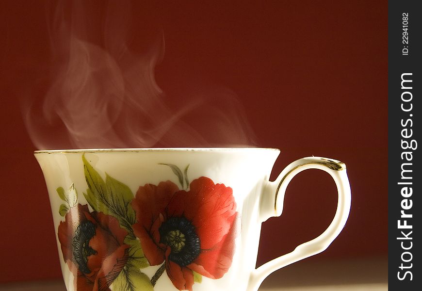 Cup of tea on red background. Cup of tea on red background