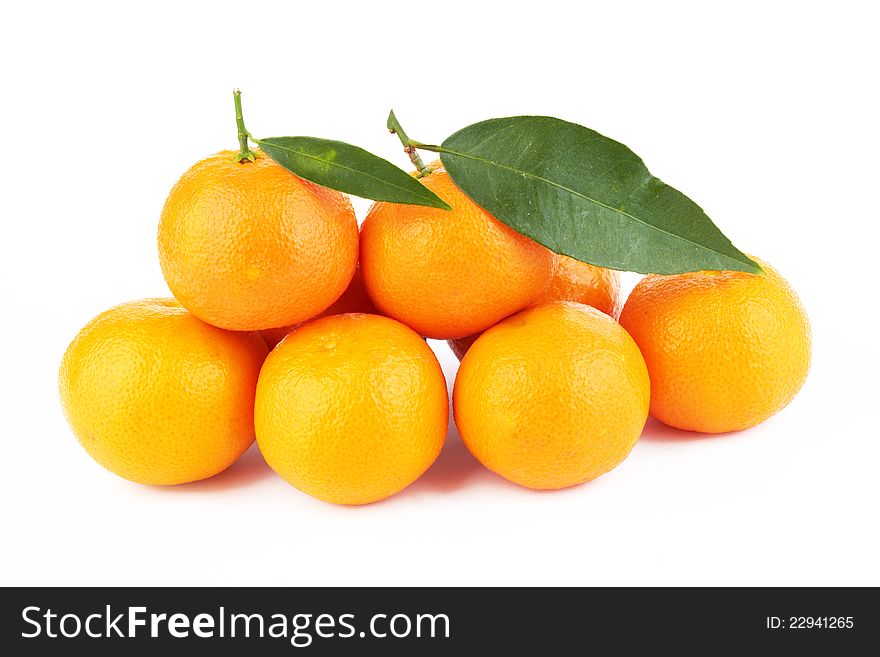 Ripe tangerines on white background