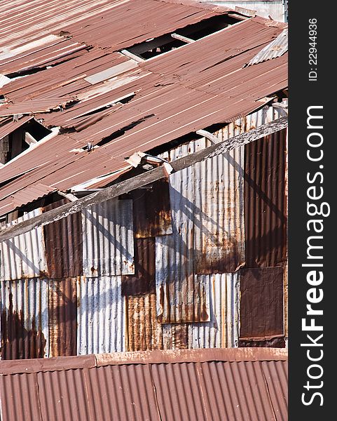 Disrepair corrugated iron warehouse in thailand. Disrepair corrugated iron warehouse in thailand