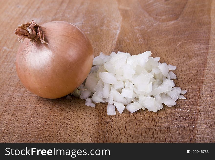Onions on a wooden cutting board