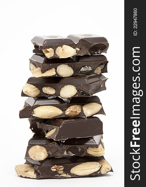 Chocolate bar with almonds and white background. Chocolate bar with almonds and white background