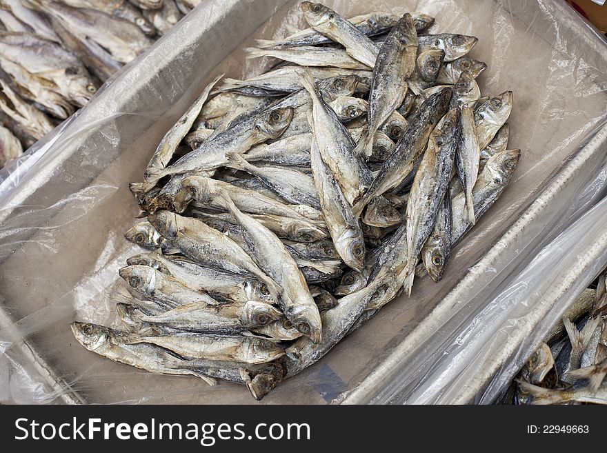 Dried fish in a box at a market