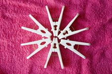 Clothes Pins On Pink Towel Royalty Free Stock Photo