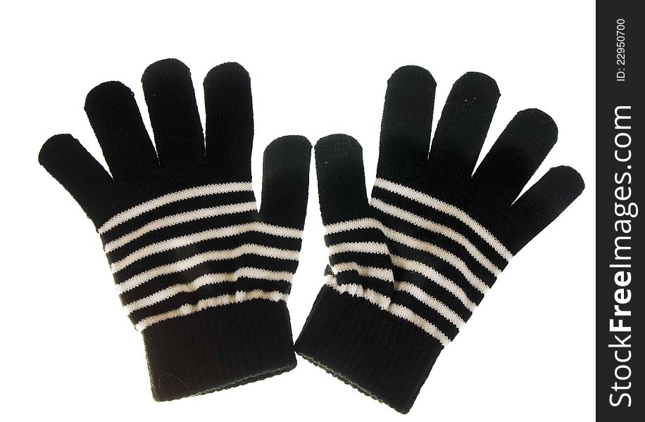 A pair of gloves, black striped with white on a white background