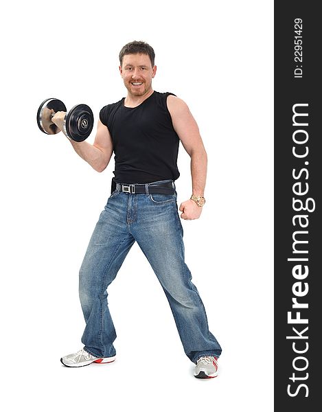 Man staying with dumbbell and smiling, on white background