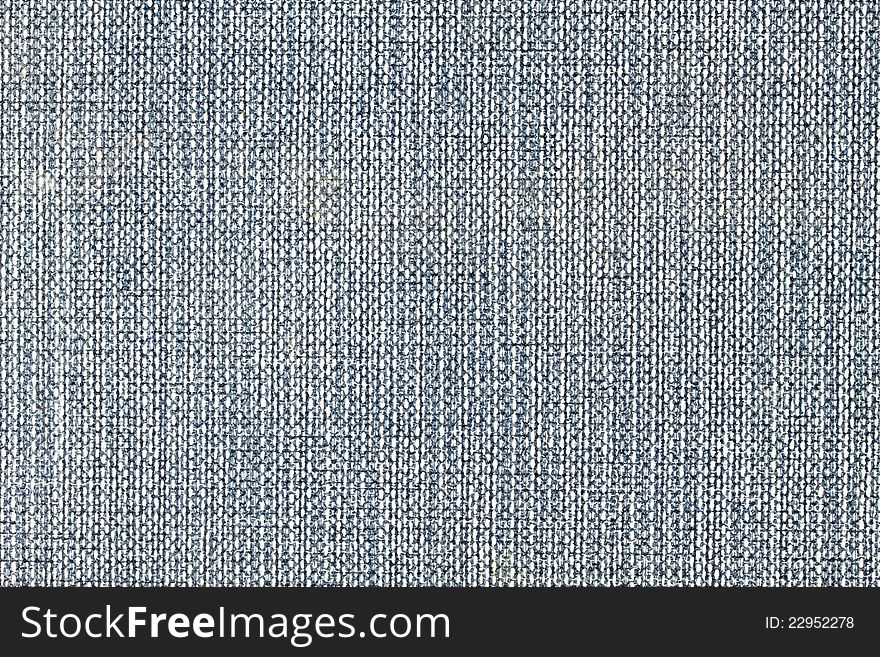 The background of blue denim fabric close up. The background of blue denim fabric close up.