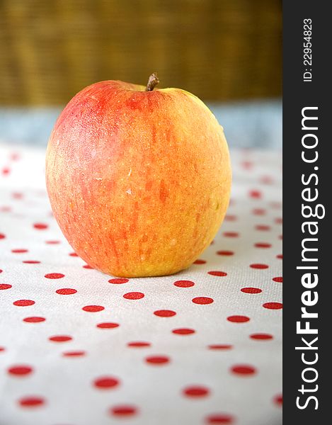 Close up apple put on polka dots table