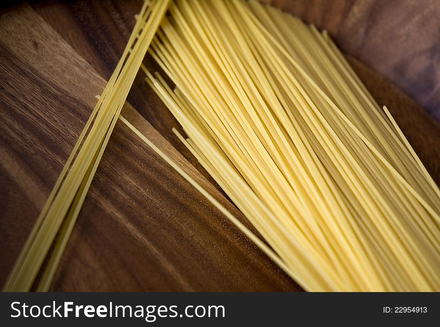 Italian pasta put on wooden tray. Italian pasta put on wooden tray