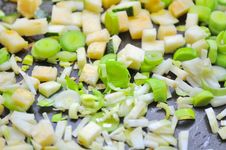 Leek, Celeriac, And Zucchini On Frying Pan Stock Photo Leek, Celeriac, And Zucchini On Frying Pan Stock Photo