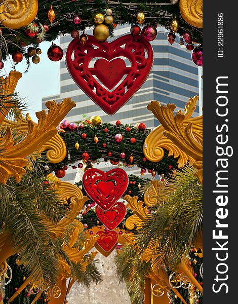 Outdoor Christmas decorations, a corridor of pine branches and hearts