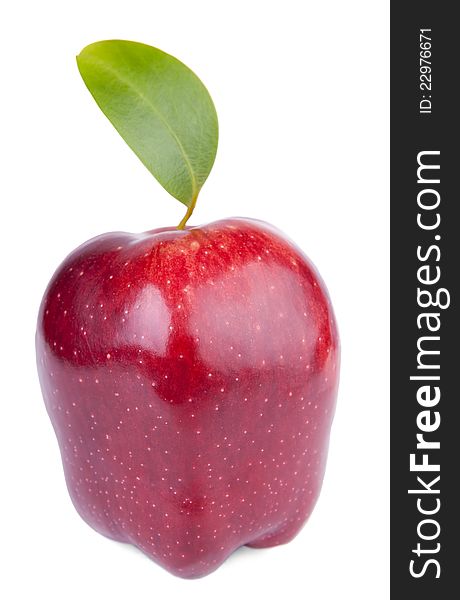 Red delicious apple with green leaf on white background