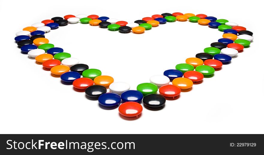 Heart lined with colorful magnets. Heart lined with colorful magnets