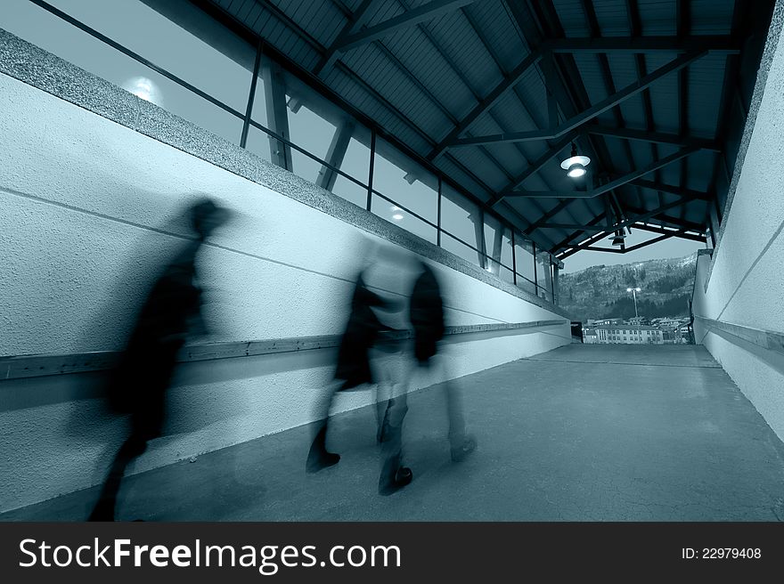 A few people on motion in a tunnel