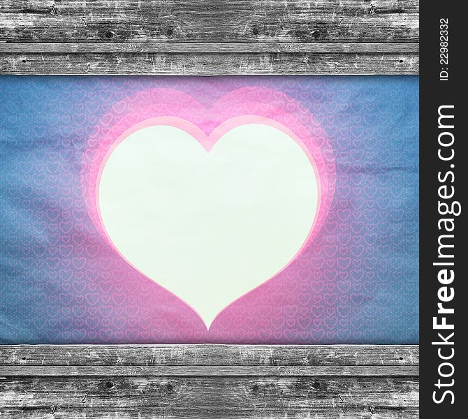 It is an old paper with heart, the gentle tones, framed with wooden boards. A background in style retro.