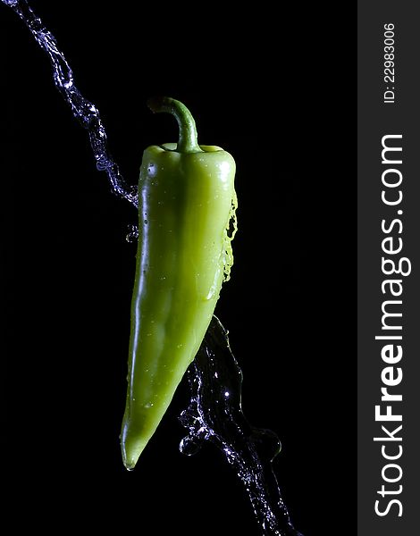 Green Pepper Splashed By Water