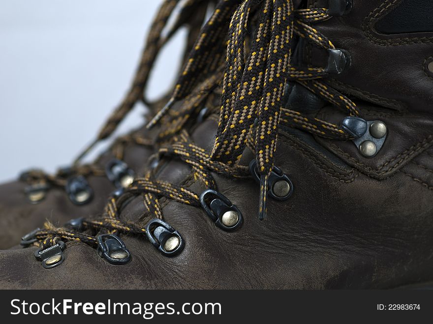 This is a closeup macro of a pair of leather hiking boots. This is a closeup macro of a pair of leather hiking boots