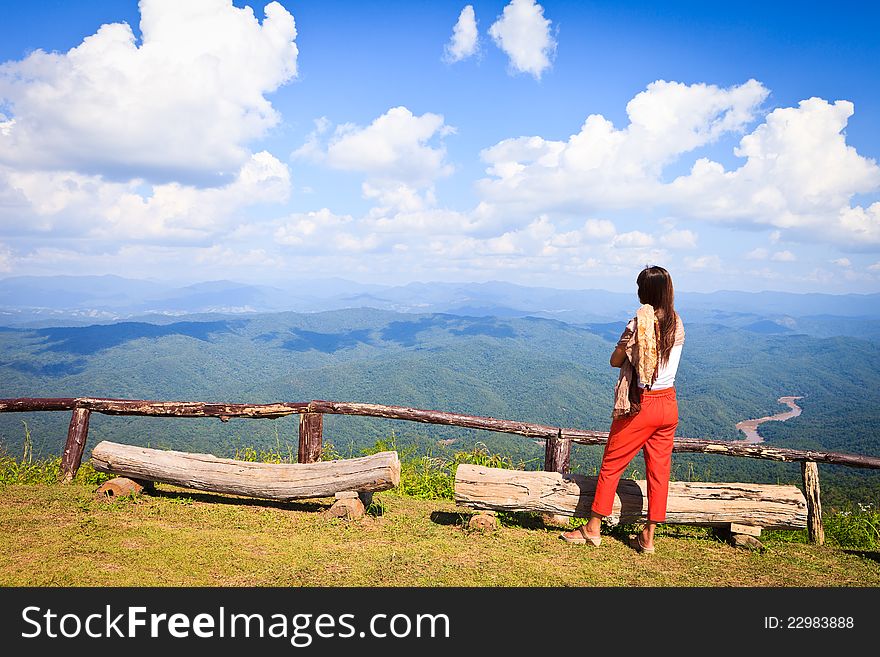 Woman see mountain with blue sky
