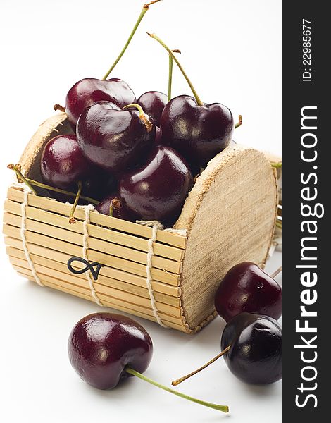 Ripe fresh cherry on white background