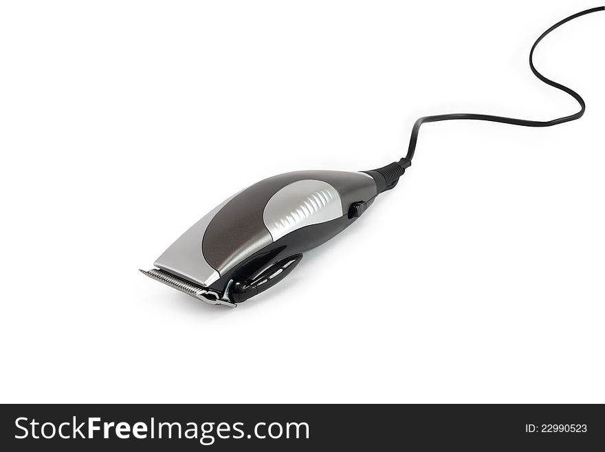 Modern electric hair clipper with cable on white background. Clipping path is included