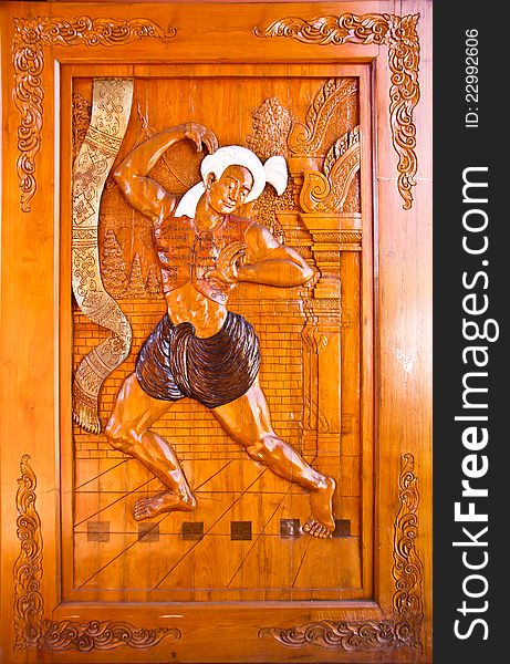 Carved wooden doors that are a form of traditional folk