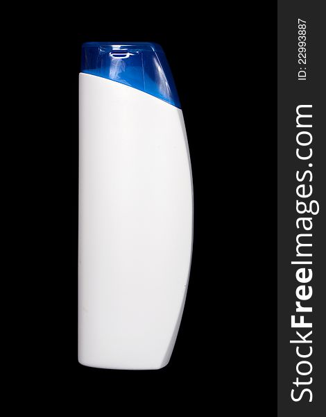 Blind white plastic bottle isolated over black. Blind white plastic bottle isolated over black