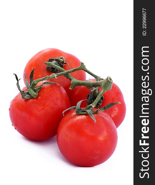 Frash rad tomatoes isolated on white background