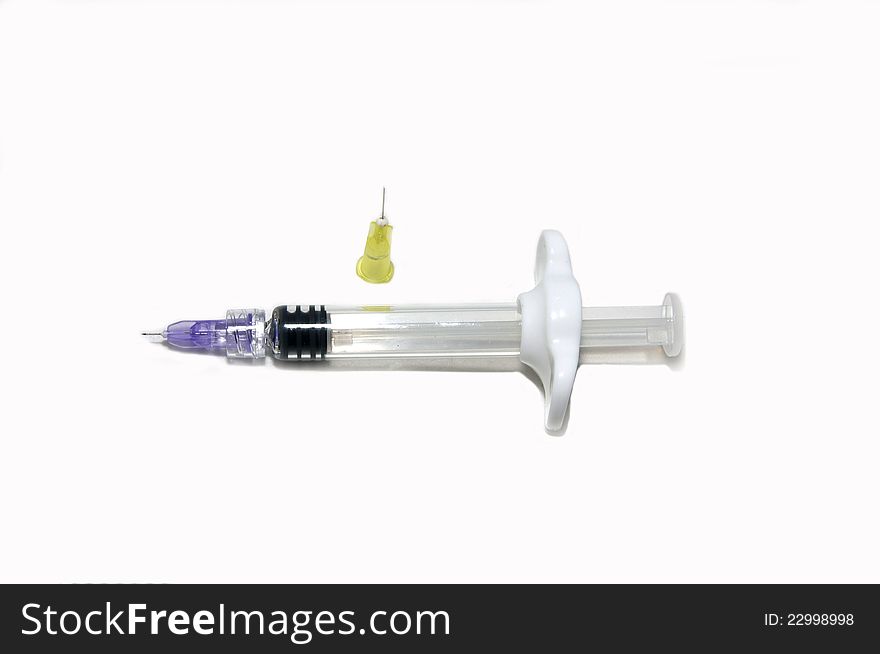 Syringe for contouring in aesthetic medicine on a white background