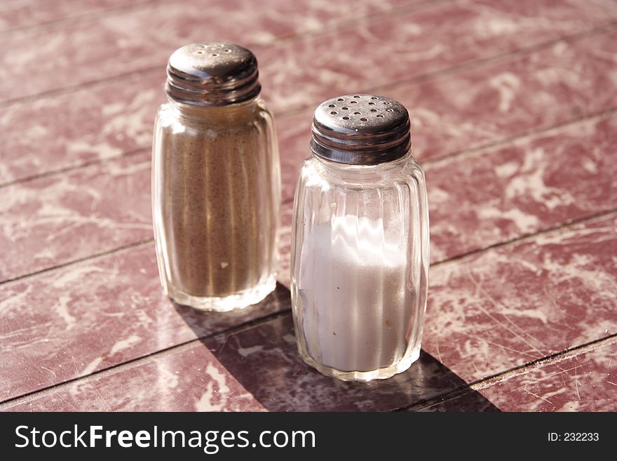 A Salt and pepper shaker pair. A Salt and pepper shaker pair