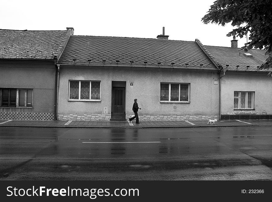 Black and white, walking past houses in czech republic. Black and white, walking past houses in czech republic