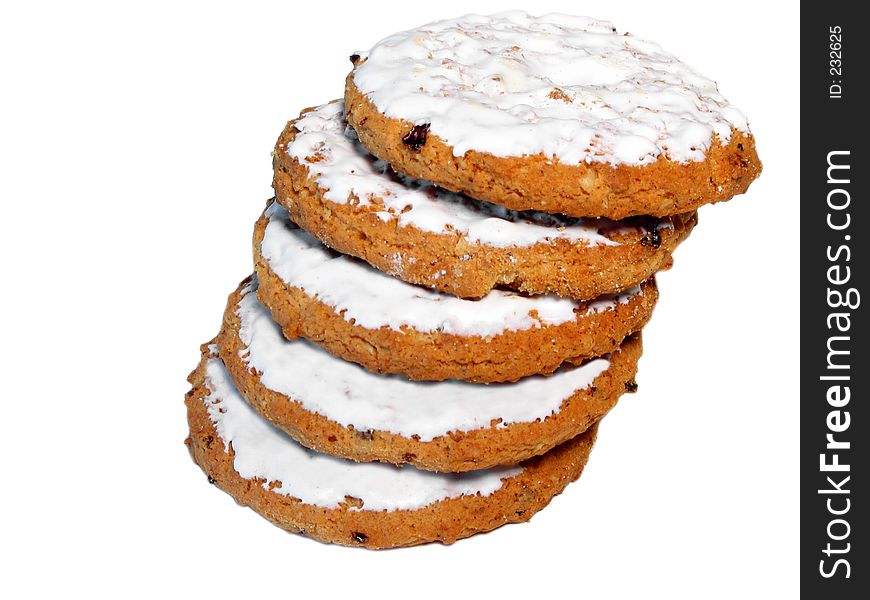 Stack of iced oatmeal cookies with raisins