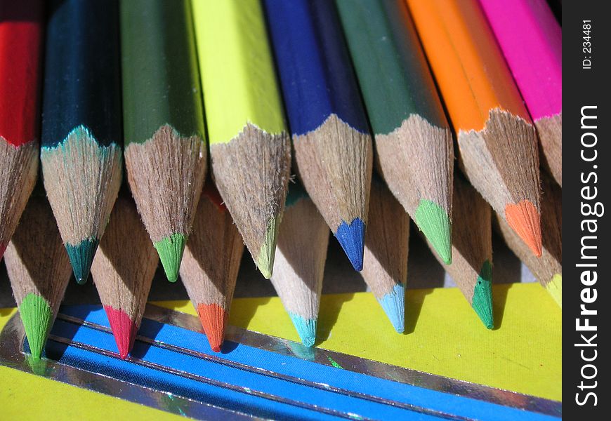 Coloured crayons left out in the sunshine. Coloured crayons left out in the sunshine