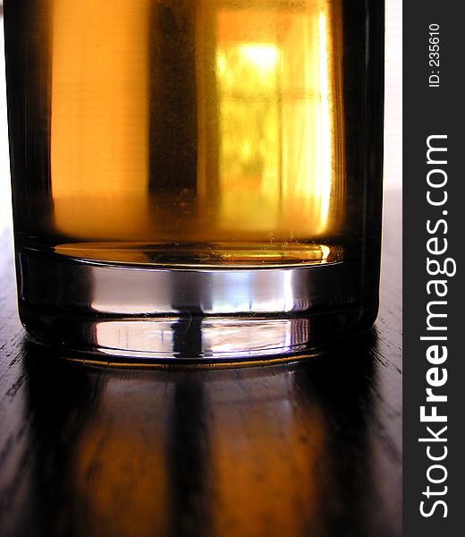 A closeup of a glass of apple juice, although it has the look of brew. A closeup of a glass of apple juice, although it has the look of brew.
