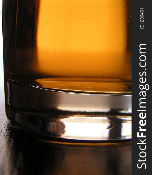 A closeup of a glass of apple juice. A closeup of a glass of apple juice.