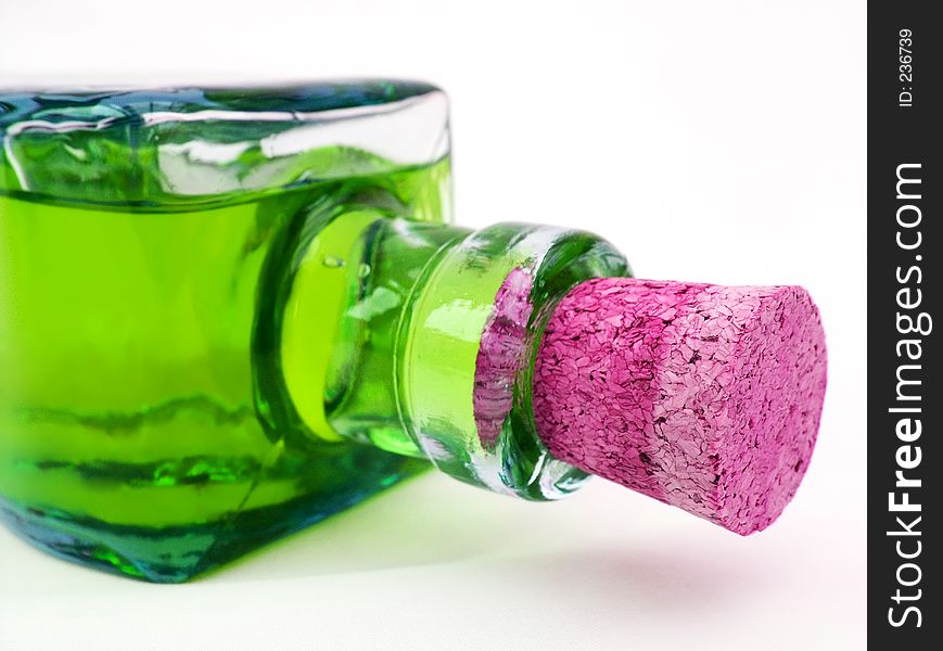 Glass bottle with green fluid. Glass bottle with green fluid