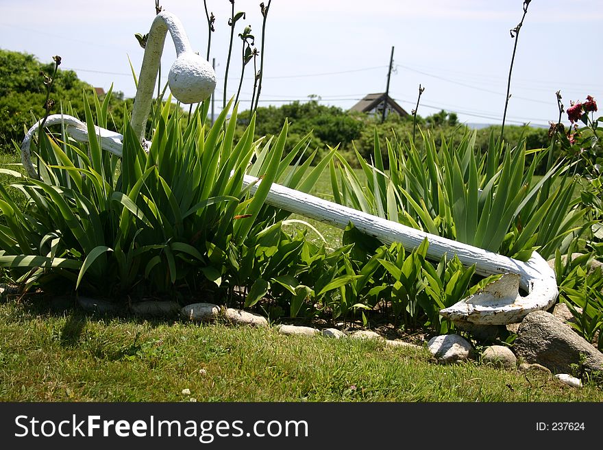 Painted White Anchor used as Lawn Ornament