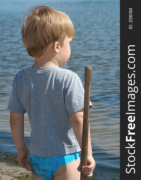 Young boy playing at the beach